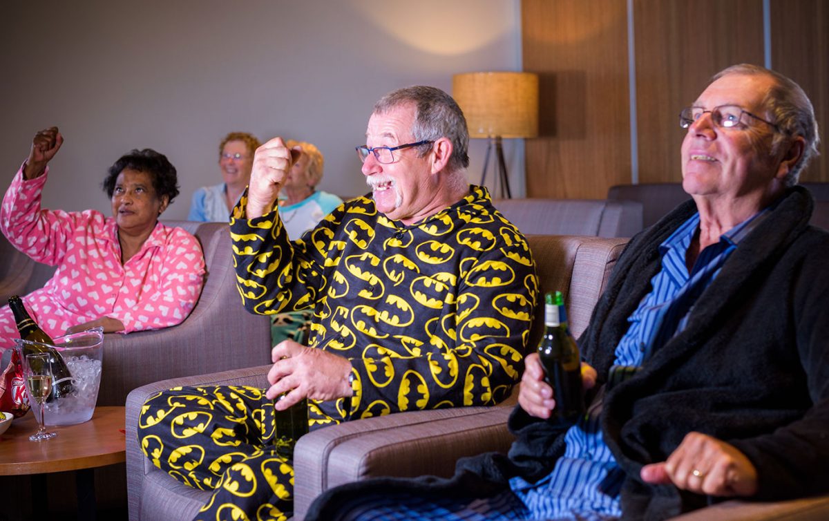 Aged care residents watching a movie