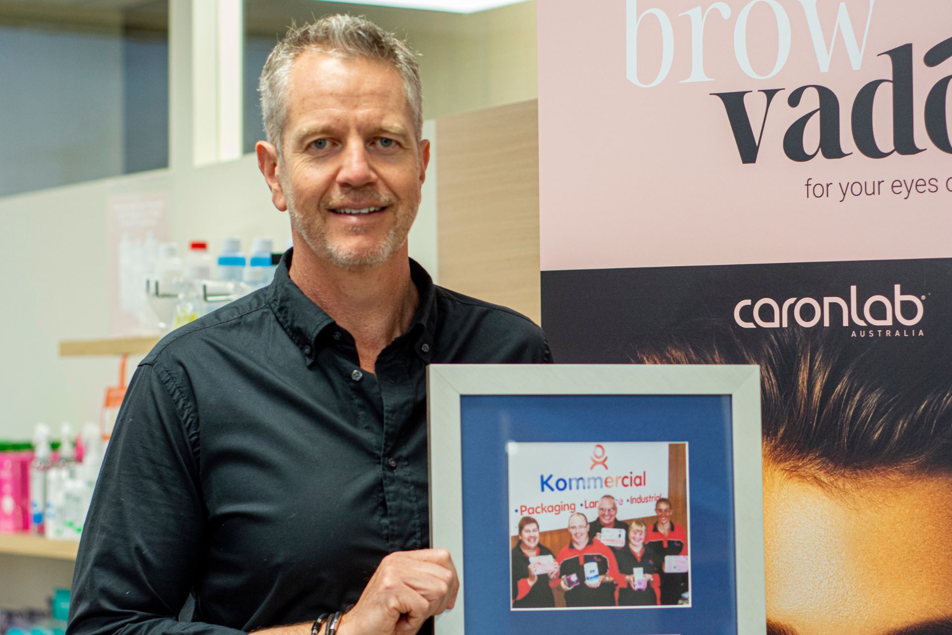 Caronlab have used genU’s Business Enterprises for more than 20 years. Caronlab CEO Greg Ure holds a 2018 plaque recognising the partnership: 1 millionth item packed milestone